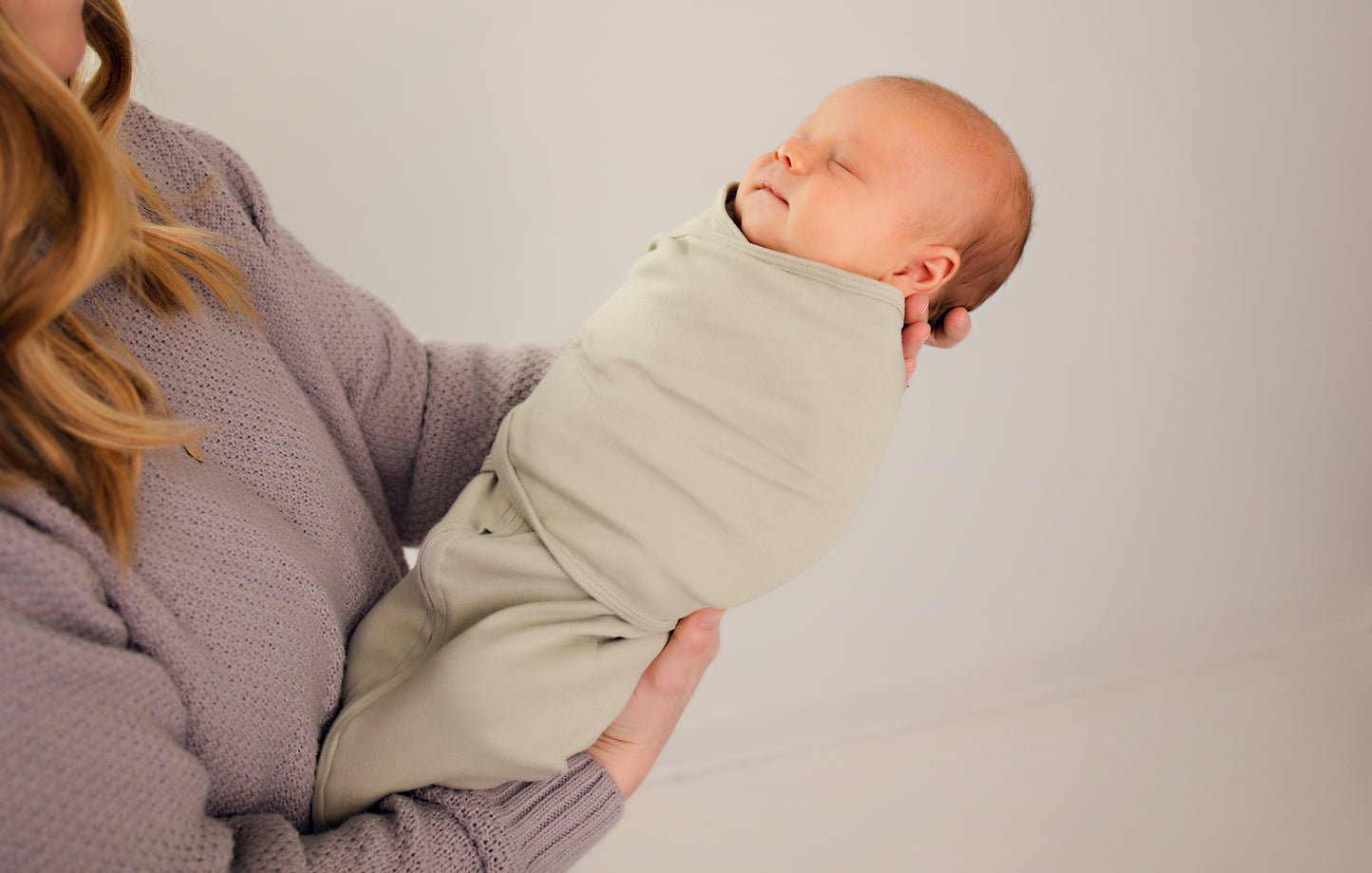 Close-up of the ultra-soft cotton fabric of LullaBaby Swaddle in Desert Sage